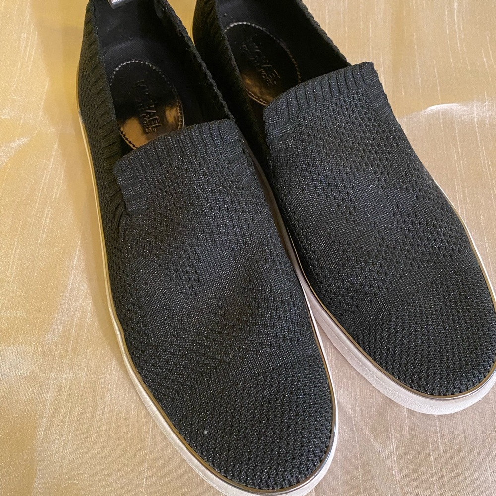 Michael Kors black slip on shoes with metallic accent